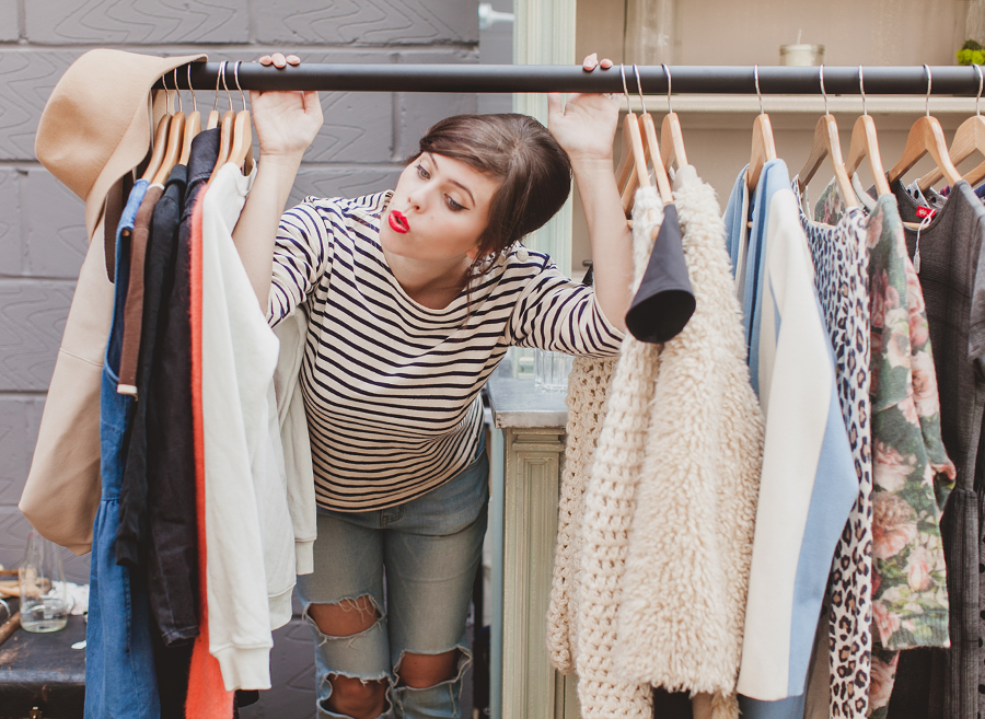 woman looking through garage sale